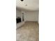 Bright living room featuring neutral paint, tile floors, and cozy fireplace, creating a welcoming ambiance at 4217 W Medlock Dr, Phoenix, AZ 85019