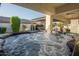 Inviting hot tub on a covered patio perfect for relaxation and outdoor entertainment at 4636 E Carriage Ct, Gilbert, AZ 85297