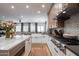 Bright, well-appointed kitchen with an island, white cabinets, and modern hardware at 4636 E Carriage Ct, Gilbert, AZ 85297