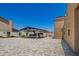Backyard featuring a covered outdoor kitchen at 4654 W Suncup Dr, San Tan Valley, AZ 85144