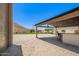 A manicured backyard connects an outdoor bar area and the trampoline, enclosed in pavers at 4654 W Suncup Dr, San Tan Valley, AZ 85144
