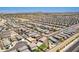 Vast aerial shot capturing an extensive community with neatly arranged homes and streets at 4654 W Suncup Dr, San Tan Valley, AZ 85144