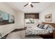 Comfortable bedroom with a ceiling fan, artwork, and a cozy bed, providing a relaxing space for rest and rejuvenation at 4909 N Woodmere Fairway -- # 1004, Scottsdale, AZ 85251