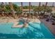 The community pool features a sun-soaked area, lounge chairs, and a refreshing pool perfect for relaxing and socializing at 4909 N Woodmere Fairway -- # 1004, Scottsdale, AZ 85251