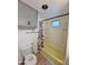 Functional bathroom featuring toilet, tub/shower combo with a colorful polka dot curtain at 530 S Alma School Rd # 75, Mesa, AZ 85210