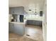 Kitchen with gray cabinets and appliances, light fixture, and yellow sink at 530 S Alma School Rd # 75, Mesa, AZ 85210