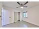 This bedroom boasts natural light, closet and a modern ceiling fan at 5324 E Hillery Dr, Scottsdale, AZ 85254