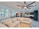 Bright living room with modern finishes, open to the kitchen and dining areas at 5324 E Hillery Dr, Scottsdale, AZ 85254