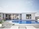 Backyard oasis featuring sparkling pool, outdoor kitchen and elegant outdoor lounge seating at 5324 E Hillery Dr, Scottsdale, AZ 85254