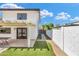 Backyard featuring a brick walkway with artificial grass and mountain view at 5435 E Cambridge Ave, Phoenix, AZ 85008