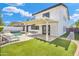 Backyard featuring a pool, patio, artificial grass, and mountain view at 5435 E Cambridge Ave, Phoenix, AZ 85008