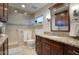 Bathroom includes granite counters, wood cabinets, shower and tile flooring at 5435 E Cambridge Ave, Phoenix, AZ 85008