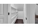 Well-organized pantry with built-in shelving for ample storage, conveniently located by the stairs at 5435 E Cambridge Ave, Phoenix, AZ 85008