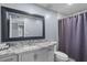 Well-appointed bathroom featuring a vanity with granite countertops and ample space at 6550 W Wolf St, Phoenix, AZ 85033