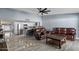 Open-concept living area with an inviting atmosphere and tile flooring at 6550 W Wolf St, Phoenix, AZ 85033