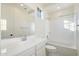 Well-lit bathroom with a combination shower and tub, and a large vanity at 6954 W Maya Way, Peoria, AZ 85383