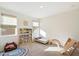 Inviting playroom with carpet, neutral colors, natural light, and fun accessories at 6954 W Maya Way, Peoria, AZ 85383