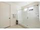 Clean shower stall showcasing a glass door, bright lighting, and a bench at 6954 W Maya Way, Peoria, AZ 85383