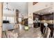 Open-concept area integrating the living room, dining area, and kitchen, great for entertaining and Gathering gatherings at 7400 E Gainey Club Dr # 203, Scottsdale, AZ 85258