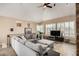 Spacious loft living room with vaulted ceiling, modern furniture, and great natural light at 7400 E Gainey Club Dr # 203, Scottsdale, AZ 85258