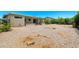 Wide shot of backyard featuring rock landscaping, a patio and a rear home elevation at 839 Leisure World --, Mesa, AZ 85206