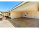 Covered carport area providing ample parking space, protection from the elements, and convenient access to the home at 839 Leisure World --, Mesa, AZ 85206