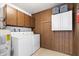 Laundry room featuring a washer, a dryer, and ample cabinet space for storage at 839 Leisure World --, Mesa, AZ 85206