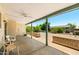 Spacious covered patio with views of the landscaped backyard, perfect for entertaining at 839 Leisure World --, Mesa, AZ 85206