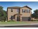 Charming two-story home with a two-car garage, a covered porch, and desert landscaping at 9541 W Pinchot Ave, Phoenix, AZ 85037