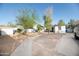 The private backyard features desert landscaping and a covered patio at 1512 E Cypress St, Phoenix, AZ 85006