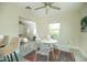 Charming dining area with stainless steel appliances, bar seating and an open view to the living room at 1512 E Cypress St, Phoenix, AZ 85006
