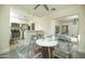 Cozy dining area open to the kitchen with stainless appliances, modern decor, and great natural light at 1512 E Cypress St, Phoenix, AZ 85006