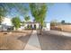 Charming home with a covered porch and easy to maintain desert landscaping at 1512 E Cypress St, Phoenix, AZ 85006