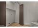This bathroom includes a linen closet and toilet at 1610 N Apache Dr, Chandler, AZ 85224