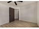 The bedroom features new flooring, and a new door at 1610 N Apache Dr, Chandler, AZ 85224