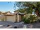 Charming two-story home with a tile roof, two car garage and well-maintained landscaping at 1610 N Apache Dr, Chandler, AZ 85224