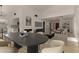 Bright living space with modern decor, fireplace, and hardwood floors providing a warm and inviting atmosphere at 1610 N Apache Dr, Chandler, AZ 85224