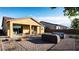 Back patio featuring seating and landscaping, perfect for outdoor living at 17382 W Artemisa Ave, Surprise, AZ 85387