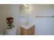 Bathroom featuring a vanity, toilet, and modern fixtures at 17770 N 66Th Ln, Glendale, AZ 85308