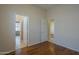 Bedroom with hardwood floors and doors at 17770 N 66Th Ln, Glendale, AZ 85308