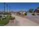 Inviting single-level home with a circular driveway and mature landscaping at 17770 N 66Th Ln, Glendale, AZ 85308