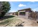 The fenced backyard is perfect for enjoying the nice weather at 18212 N 43Rd Pl, Phoenix, AZ 85032