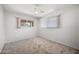 Bedroom offering natural light from a window and neutral colored carpet and walls at 18212 N 43Rd Pl, Phoenix, AZ 85032