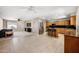 Spacious kitchen with stainless steel appliances and an open layout connecting to the living area at 18212 N 43Rd Pl, Phoenix, AZ 85032