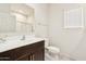 Bright bathroom with vanity, mirror, toilet and shower/tub combination at 18333 N Presley Ln, Maricopa, AZ 85138