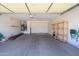 Spacious garage with ample storage and utility connections at 18651 N Salerno Ct, Surprise, AZ 85387