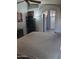 Cozy main bedroom with neutral tones, wood floors, and ensuite bathroom access at 2125 E Danbury Rd, Phoenix, AZ 85022