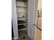Pantry with multiple shelves and pull-out drawers to maximize storage space at 2125 E Danbury Rd, Phoenix, AZ 85022