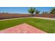 Artificial turf in backyard with plenty of room for relaxing and playing games at 215 S 132Nd St, Chandler, AZ 85225
