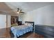 Bedroom with wood floors and closet at 215 S 132Nd St, Chandler, AZ 85225